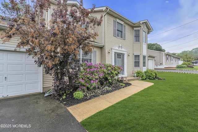 2124 3rd Ave, Toms River, NJ 08757 - view of front of home featuring a garage and a front lawn