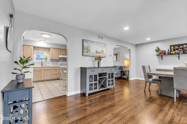 2124 3rd Ave, Toms River, NJ 08757 - dining room with arched walkways, wood finished floors, recessed lighting, and baseboards