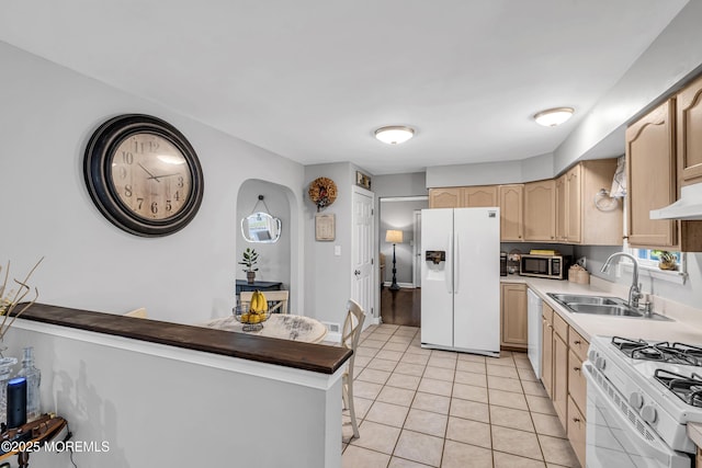 2124 3rd Ave, Toms River, NJ 08757 - kitchen featuring white appliances, a sink, light brown cabinets, and light tile patterned floors