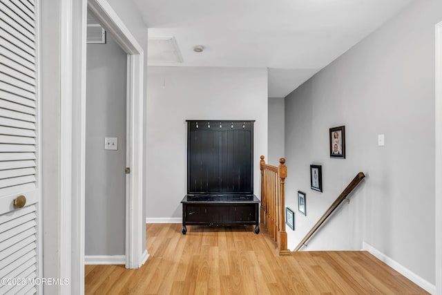 2124 3rd Ave, Toms River, NJ 08757 - hallway with an upstairs landing, attic access, wood finished floors, and baseboards
