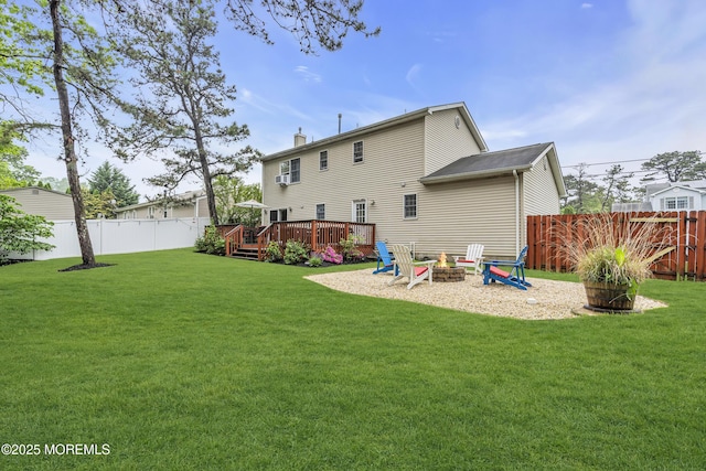 2124 3rd Ave, Toms River, NJ 08757 - rear view of house featuring a fire pit, a deck, and a chimney