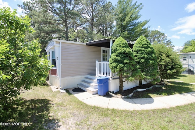 41 Eagle Dr, Whiting, NJ 08759 - view of property exterior featuring a lawn