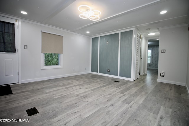 41 Eagle Dr, Whiting, NJ 08759 - empty room with healthy amount of natural light, crown molding, wood finished floors, baseboards, and recessed lighting