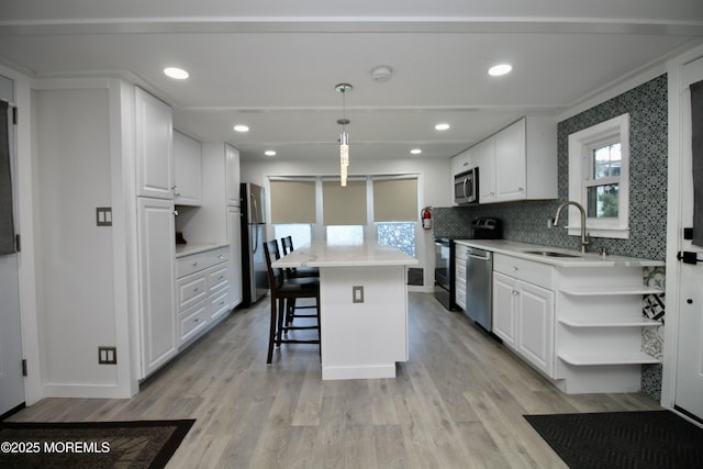 41 Eagle Dr, Whiting, NJ 08759 - kitchen with a sink, appliances with stainless steel finishes, white cabinets, and recessed lighting