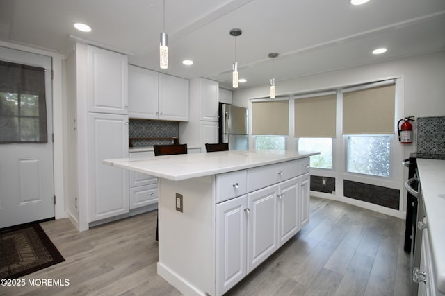 41 Eagle Dr, Whiting, NJ 08759 - kitchen featuring freestanding refrigerator, white cabinets, light wood-style floors, light countertops, and recessed lighting