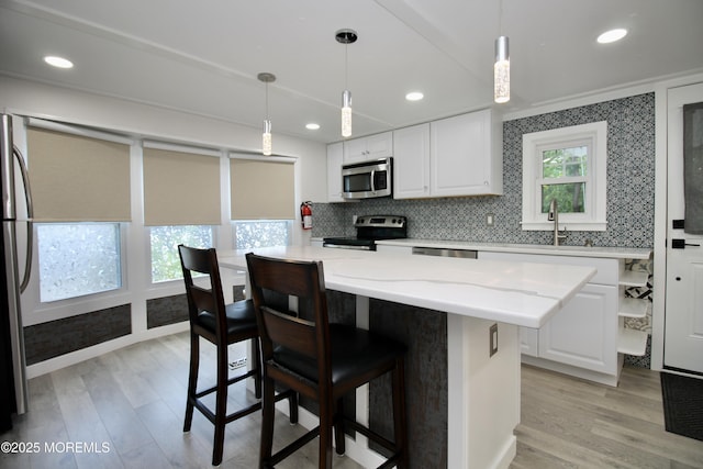 41 Eagle Dr, Whiting, NJ 08759 - kitchen featuring stainless steel appliances, light wood-type flooring, white cabinetry, and recessed lighting