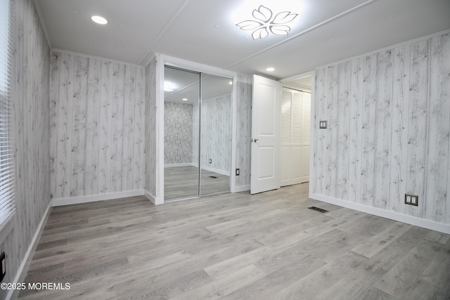 41 Eagle Dr, Whiting, NJ 08759 - unfurnished bedroom featuring wood finished floors, wooden walls, baseboards, and recessed lighting