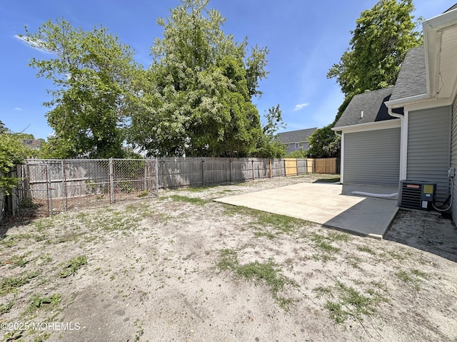 143 2nd Ave, Toms River, NJ 08757 - fenced backyard with cooling unit and a patio area