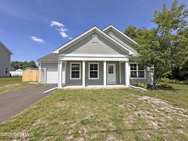 143 2nd Ave, Toms River, NJ 08757 - view of front of property featuring an attached garage, driveway, a front yard, and covered porch
