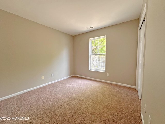 143 2nd Ave, Toms River, NJ 08757 - carpeted spare room featuring baseboards