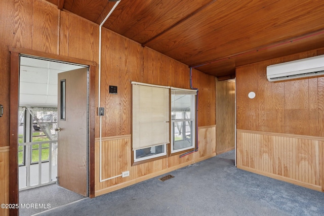 220 W Sylvania Ave Unit 16, Neptune City, NJ 07753 - carpeted spare room featuring wooden walls, an AC wall unit, and wooden ceiling