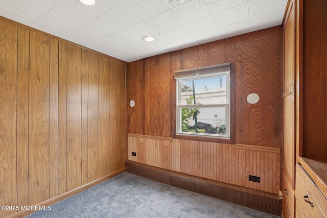 220 W Sylvania Ave Unit 16, Neptune City, NJ 07753 - unfurnished room with carpet floors and wood walls