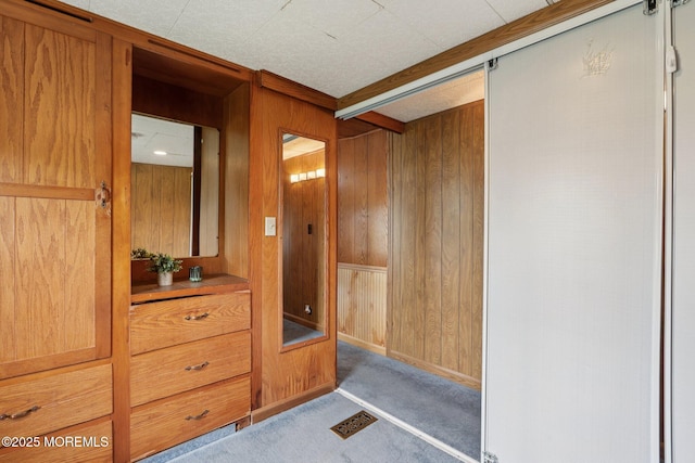220 W Sylvania Ave Unit 16, Neptune City, NJ 07753 - interior space featuring wooden walls and carpet