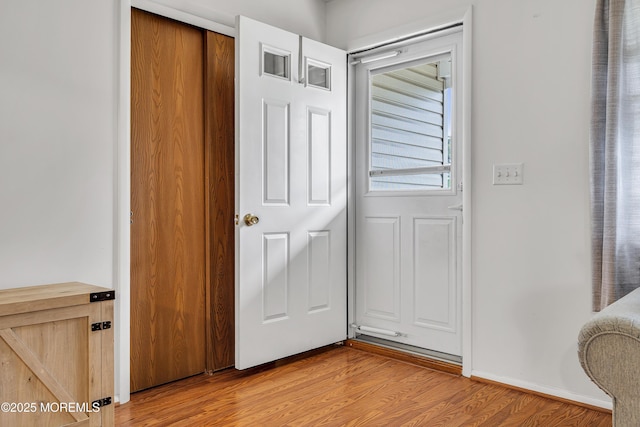 32 Bugle Ct, Toms River, NJ 08757 - doorway to outside with light wood-style flooring