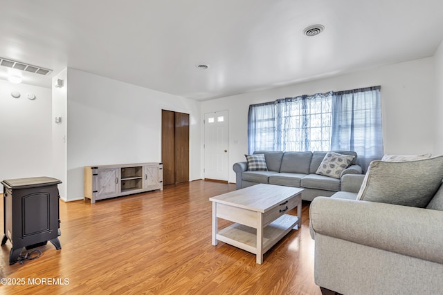 32 Bugle Ct, Toms River, NJ 08757 - living area featuring light wood-style floors and baseboards
