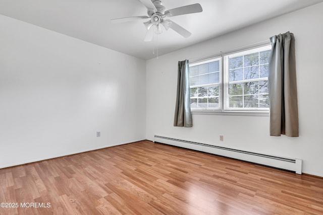 32 Bugle Ct, Toms River, NJ 08757 - unfurnished room with a baseboard radiator, light wood-style flooring, ceiling fan, and baseboards