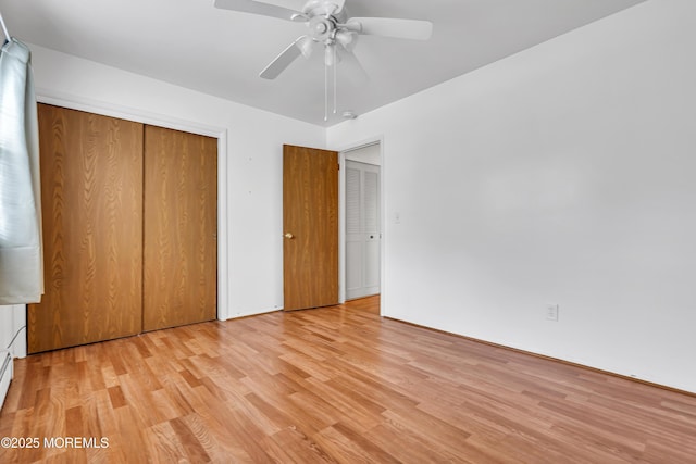 32 Bugle Ct, Toms River, NJ 08757 - unfurnished bedroom featuring light wood-style flooring, a closet, and a ceiling fan