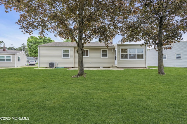 32 Bugle Ct, Toms River, NJ 08757 - back of house with a yard, central air condition unit, and a patio