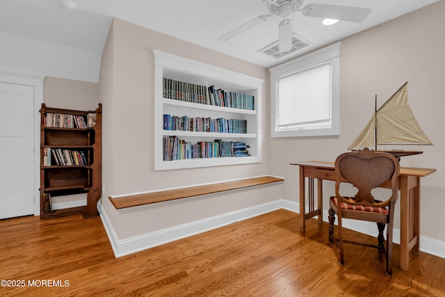 3 Sunset Dr, Asbury Park, NJ 07712 - living area featuring ceiling fan, wood finished floors, and baseboards