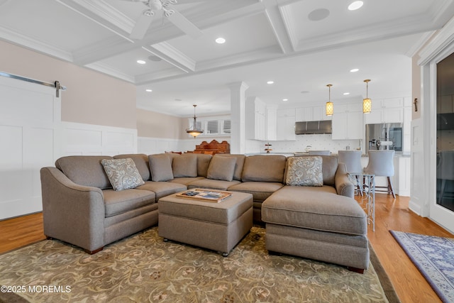 3 Sunset Dr, Asbury Park, NJ 07712 - living area with coffered ceiling, beamed ceiling, recessed lighting, ceiling fan, and a wainscoted wall