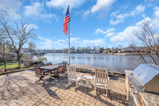 3 Sunset Dr, Asbury Park, NJ 07712 - view of patio with a water view, a grill, and outdoor dining space