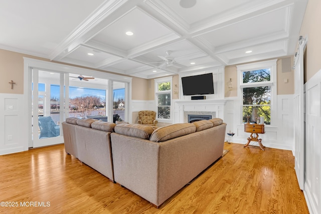 3 Sunset Dr, Asbury Park, NJ 07712 - living room with a ceiling fan, a decorative wall, coffered ceiling, a fireplace, and beam ceiling