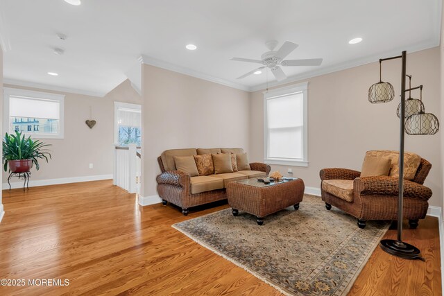 3 Sunset Dr, Asbury Park, NJ 07712 - living area featuring light wood finished floors, ceiling fan, ornamental molding, recessed lighting, and baseboards