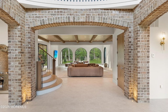 1 Preakness Way, Colts Neck, NJ 07722 - living room with beam ceiling, stairs, and arched walkways