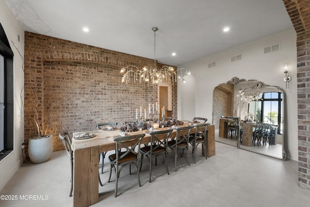 1 Preakness Way, Colts Neck, NJ 07722 - dining space with a chandelier, brick wall, and recessed lighting