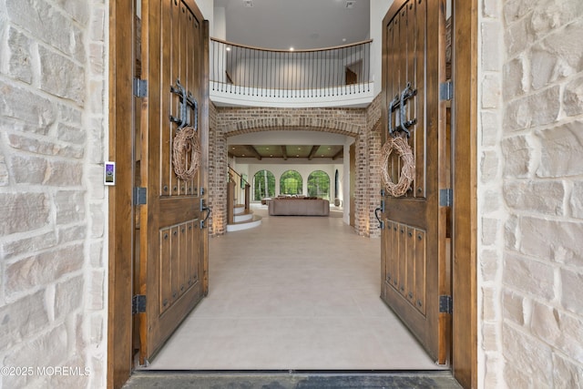 1 Preakness Way, Colts Neck, NJ 07722 - entryway featuring arched walkways and a high ceiling