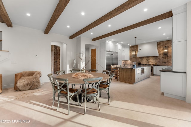 1 Preakness Way, Colts Neck, NJ 07722 - dining space with arched walkways, recessed lighting, and beam ceiling