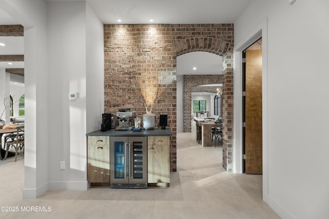 1 Preakness Way, Colts Neck, NJ 07722 - indoor dry bar featuring beverage cooler, brick wall, baseboards, and recessed lighting