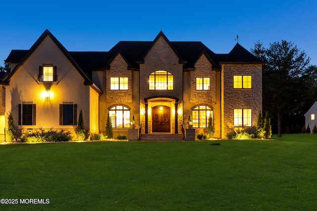 1 Preakness Way, Colts Neck, NJ 07722 - french provincial home featuring stone siding, a front lawn, and stucco siding