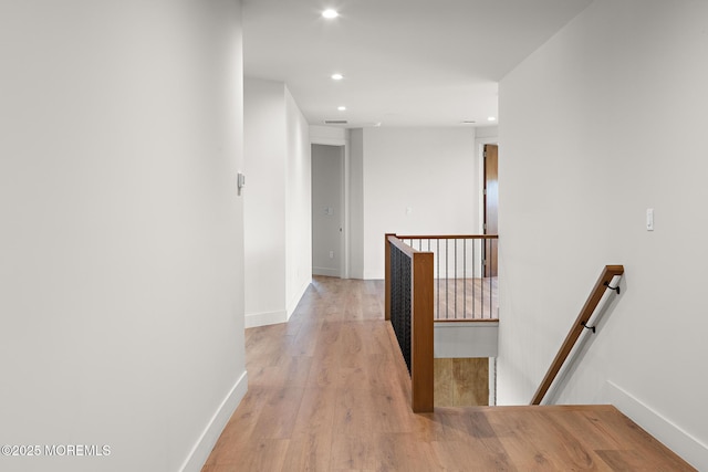 1 Preakness Way, Colts Neck, NJ 07722 - hallway with an upstairs landing, recessed lighting, baseboards, and light wood-style floors