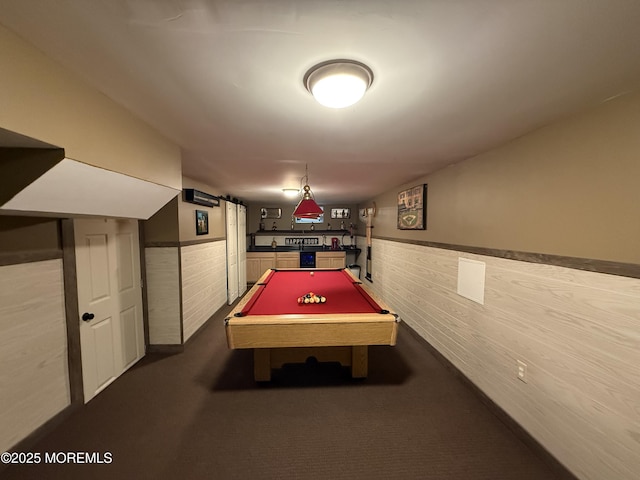 recreation room with wainscoting, dark carpet, and billiards table