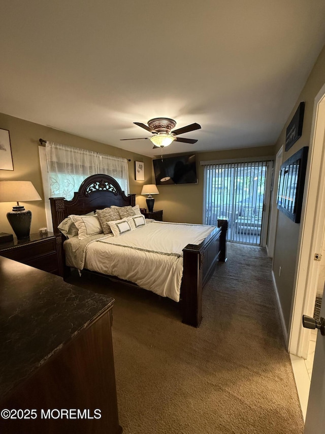 bedroom with carpet flooring, access to outside, and a ceiling fan