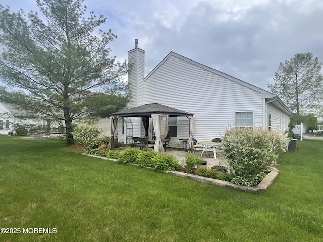 6 Ravenna Rd, Manchester, NJ 08759 - rear view of property with a gazebo, a patio, a chimney, and a yard