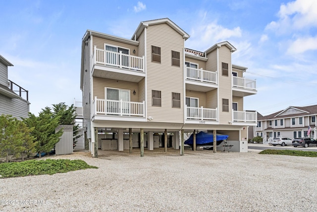 1707 Bay Blvd Unit 4, Seaside Heights, NJ 08751 - view of front facade featuring a carport and driveway