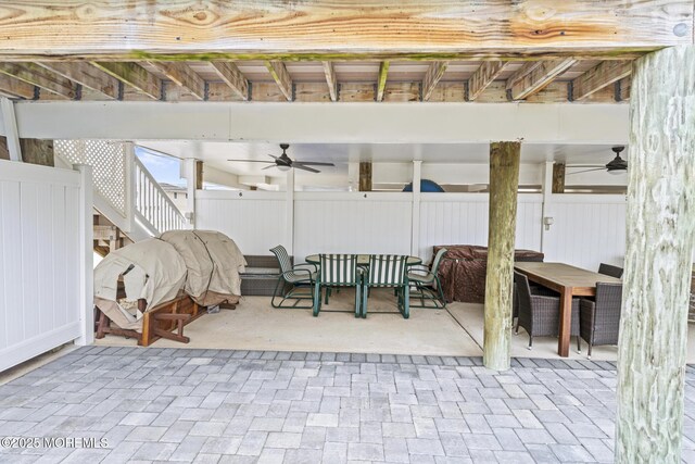 1707 Bay Blvd Unit 4, Seaside Heights, NJ 08751 - view of patio / terrace featuring outdoor dining area, ceiling fan, and stairs