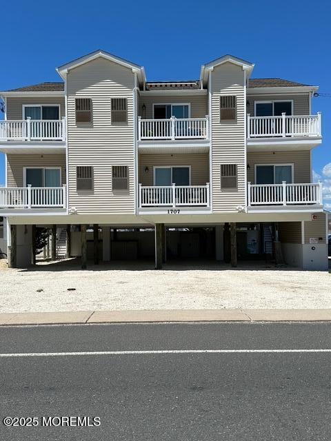 1707 Bay Blvd Unit 4, Seaside Heights, NJ 08751 - view of property with a carport and driveway