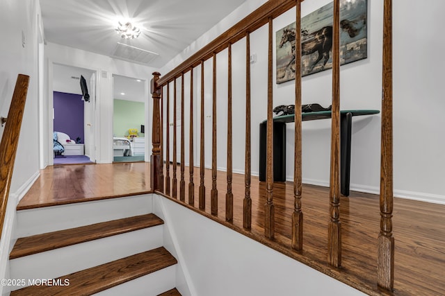 8 Eileen Ln, Marlboro, NJ 07746 - stairway featuring wood finished floors