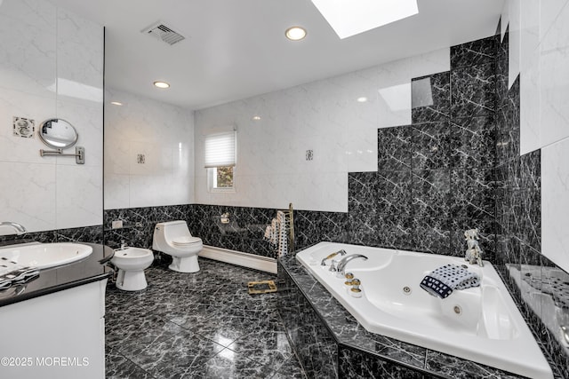 8 Eileen Ln, Marlboro, NJ 07746 - full bath featuring tile walls, a bidet, toilet, a tub with jets, and vanity