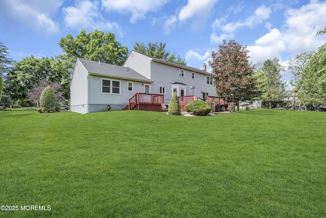 8 Eileen Ln, Marlboro, NJ 07746 - rear view of house featuring a deck and a yard