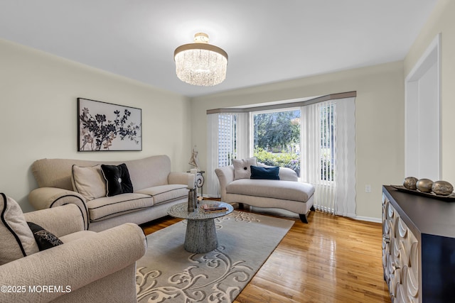 8 Eileen Ln, Marlboro, NJ 07746 - living room featuring light wood finished floors and baseboards