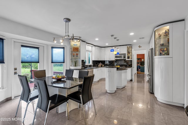 8 Eileen Ln, Marlboro, NJ 07746 - dining space with plenty of natural light and recessed lighting