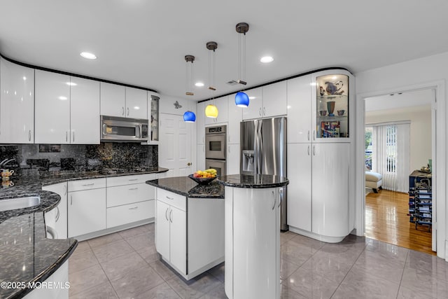 8 Eileen Ln, Marlboro, NJ 07746 - kitchen with appliances with stainless steel finishes, white cabinetry, glass insert cabinets, a center island, and hanging light fixtures