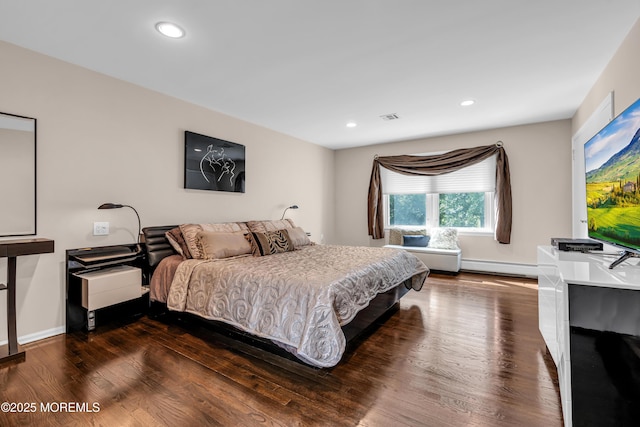 8 Eileen Ln, Marlboro, NJ 07746 - bedroom with baseboard heating, dark wood-style floors, recessed lighting, and baseboards