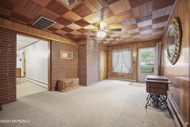 624 Lloyd Rd, Aberdeen, NJ 07747 - interior space with baseboard heating, a baseboard heating unit, wood ceiling, brick wall, and ceiling fan