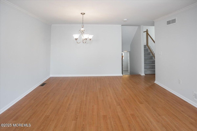 24 Hanna Ln Unit 304, Laurence Harbor, NJ 08879 - unfurnished room with a chandelier, stairs, light wood-type flooring, baseboards, and ornamental molding