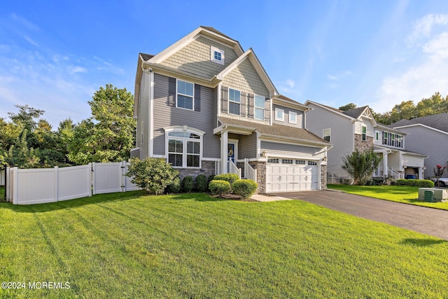 22 Imlay Ln, Farmingdale, NJ 07727 - view of front of property featuring stone siding, asphalt driveway, a gate, and a garage